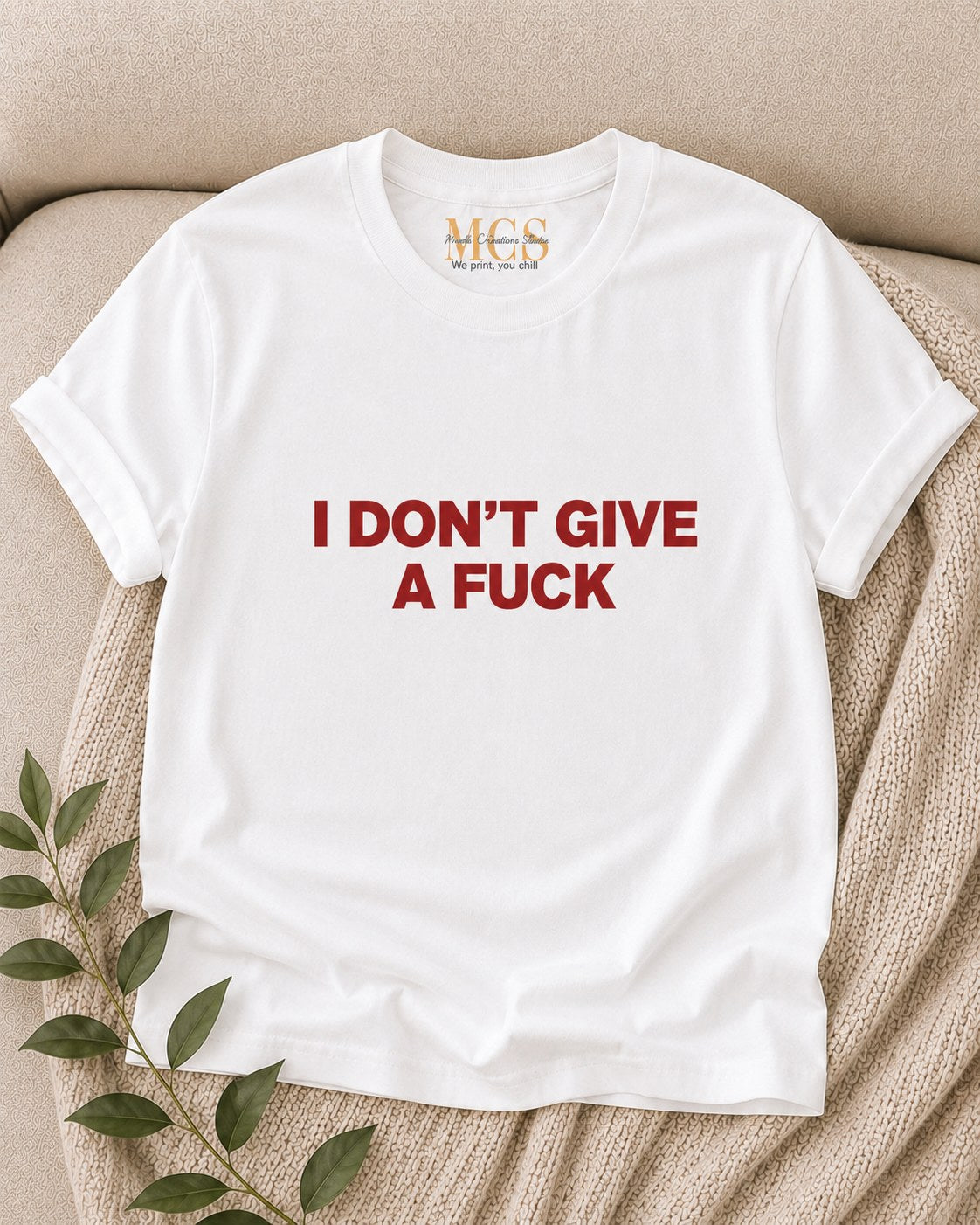 White t-shirt with bold red lettering: I don't give a f*ck