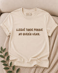Cream t-shirt with brown lettering: Llegué tarde porque no quería venir
