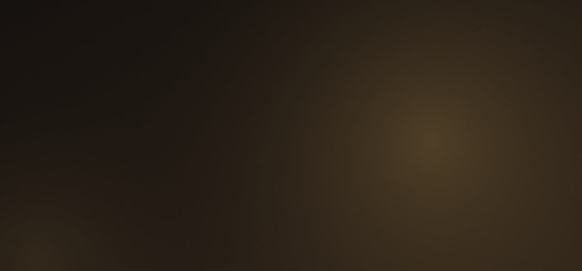 Dark brown background with a soft gold glow