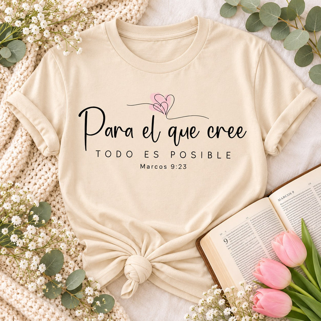 Cream t-shirt flat lay printed with Para el que cree, todo es posible, Marcos 9:23, and a pink heart